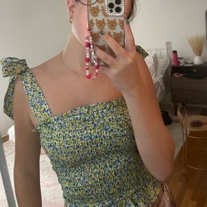 Smocked with bow tied top